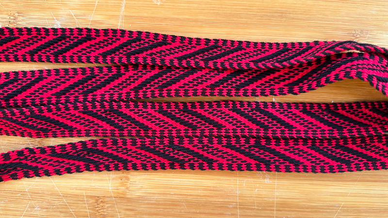 Taipalsaarelainen palmikkovyö pirtanauha.