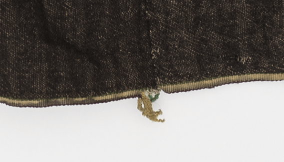 Yksityiskohta hameen helmasta Kaukola.