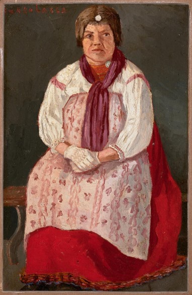 Sakkolainen nainen huntu päässään.