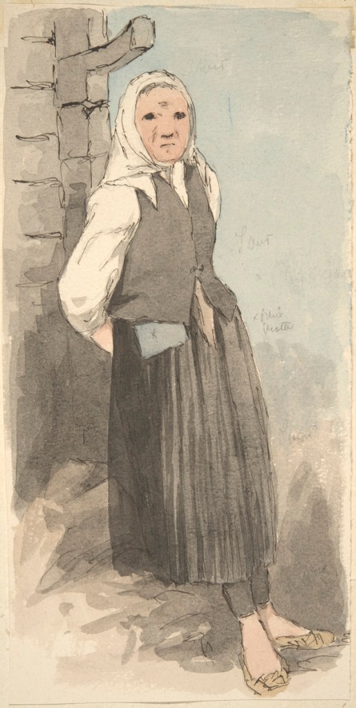 Huntupäinen vaimo, jolla on musta tankkiliivi, mustat kalsut ja musta hame sekä valkoinen päähuivi.